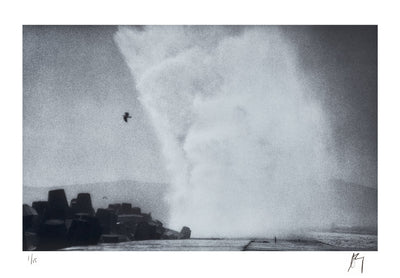 Big wave hitting breakwater at V&A Waterfront, Cape Town | Fine art lithographic photograph by Chad Henning