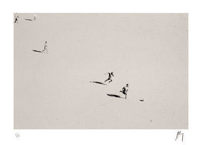 Boys playing soccer on beach | Fine art photographic print by Chad Henning