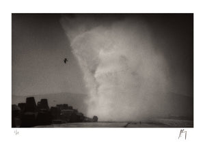 Big wave hitting breakwater at V&A Waterfront, Cape Town | Fine art lithographic photograph by Chad Henning