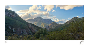 Dramatic du Toitskloof Mountains in early morning light with clouds | Fine Art Photographic print by Chad Henning