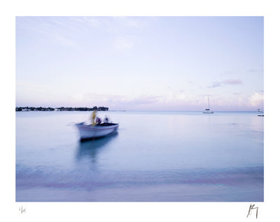 A traditional fishing boat glides to the shore in pre dawn light, Mauritius | Fine Art photographic print by Chad Henning