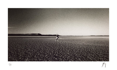 Young boy doing cartwheels, desert Acrobat near Brandvlei Northern Cape | Fine art photographic print by Chad henning